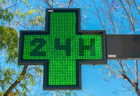 medical twenty-four-hour drugstore signboard at day